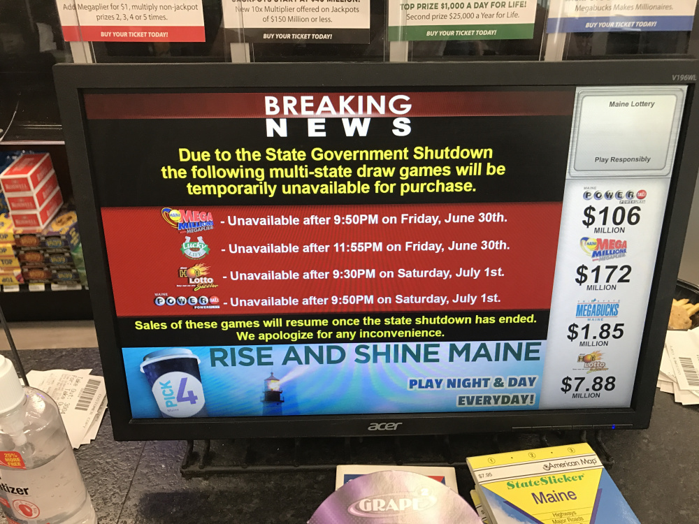A sign at Joe's Super Variety on Congress Street in Portland informs customers that lottery tickets are unavailable on Saturday, July 1, 2017.