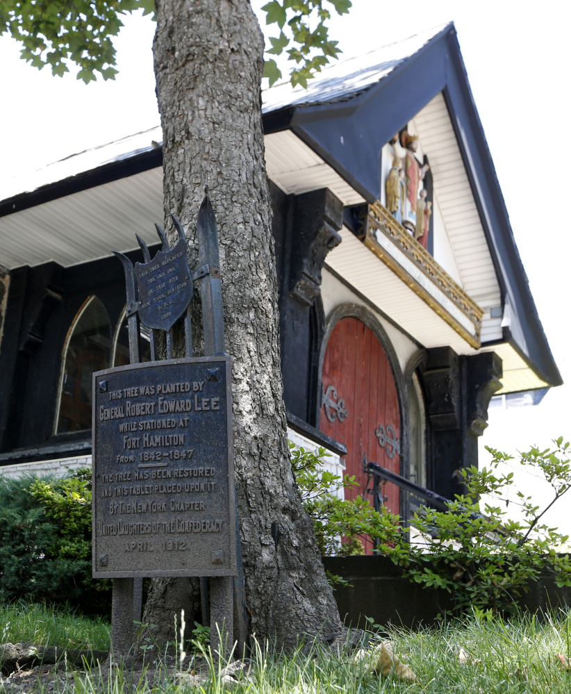 A plaque marks a maple tree planted by Robert E. Lee on the grounds of St. John's Episcopal Church in Brooklyn, who was stationed at nearby Fort Hamilton from 1842-1847.
