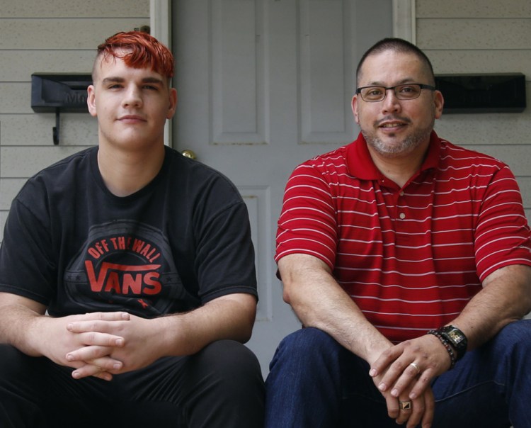 Christopher Segovia with his father, Luis. Christopher, 18, spent more than a month in the hospital awaiting a bed at a group home for intellectually disabled adults.
