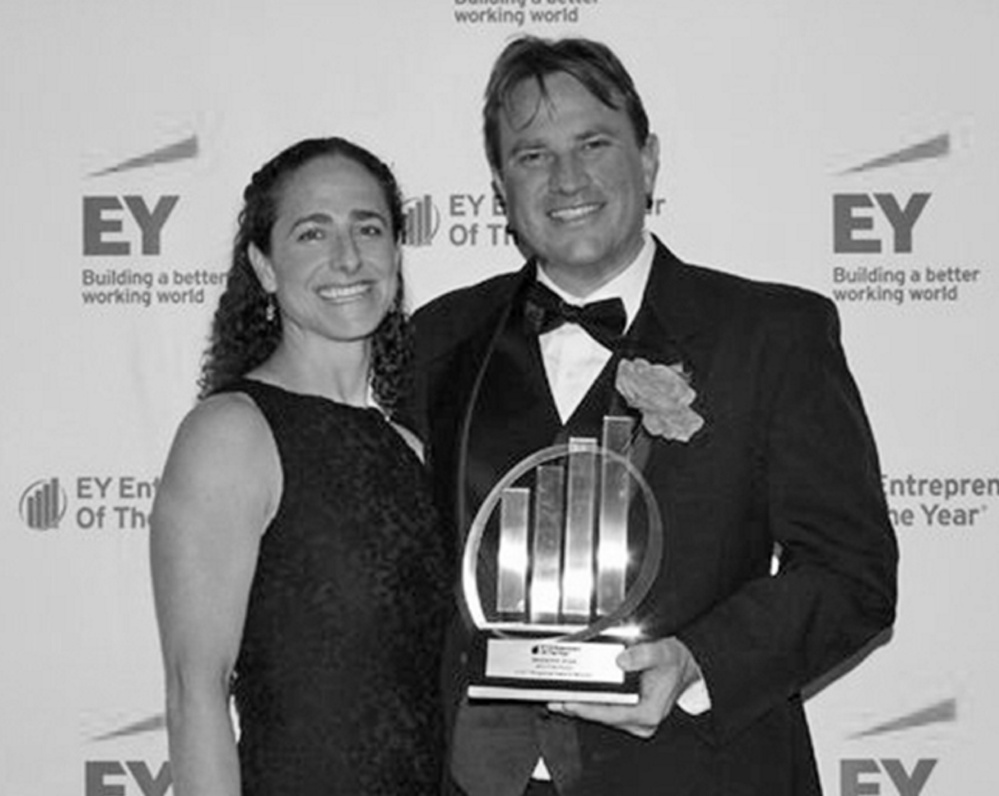 Entrepreneur award winner Ben Shaw and his wife, Bernadette, enjoy the moment at an Ernst & Young event.
