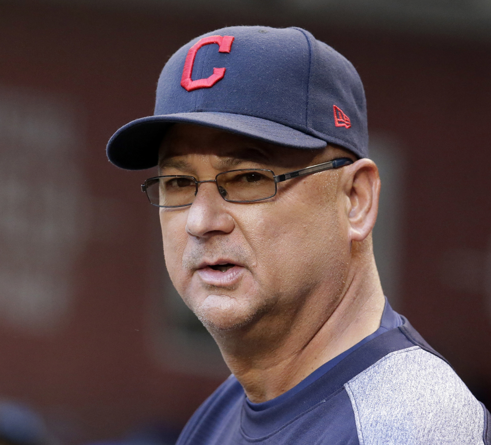 In this April 8, 2017, file photo, Cleveland Indians manager Terry Francona looks over the field during the first inning of a baseball game against the Arizona Diamondbacks, in Phoenix.