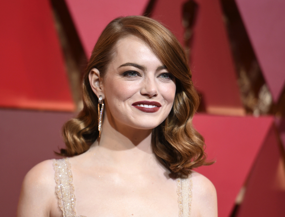 Emma Stone says male co-stars have taken pay cuts to ensure she received equal pay on films. She will portray Billie Jean King in the upcoming "Battle of the Sexes."