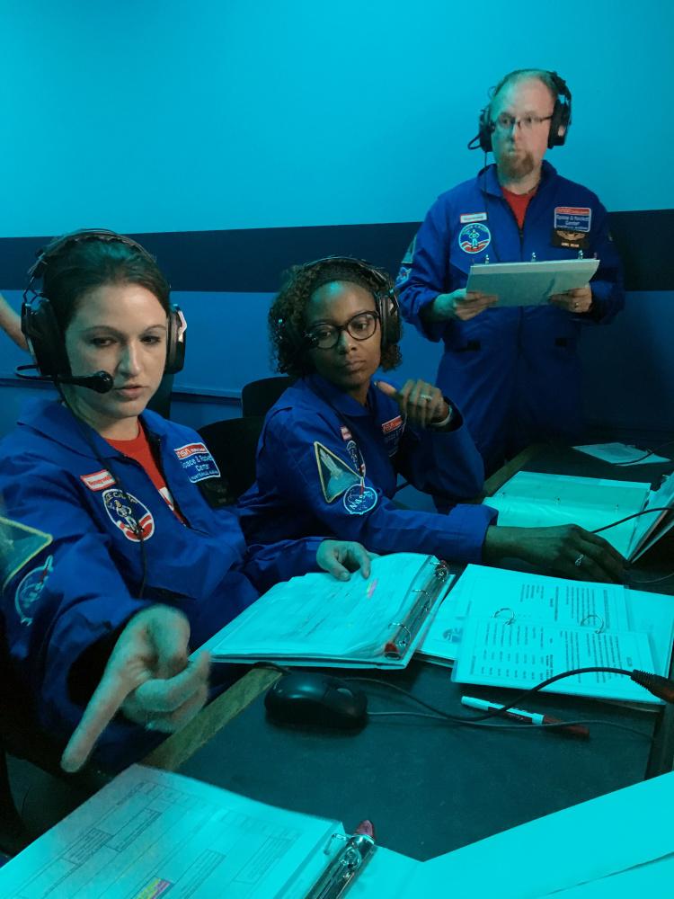 Breanne Desmond, a sixth-grade science teacher at the Vassalboro Community School, takes part in a simulated mission during a one-week program at the Honeywell Educators at Space Academy in Alabama.