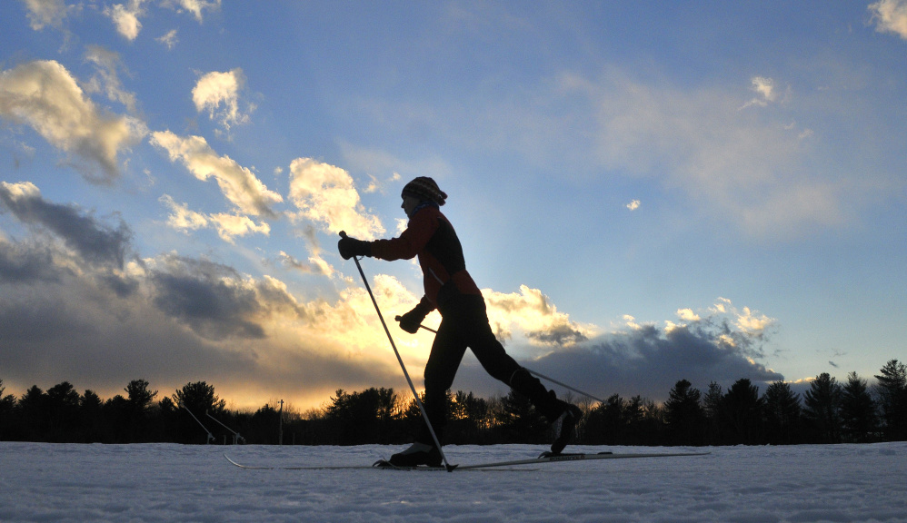 Jesse Hamilton, of Waterville, skis by headlamp at Quarry Road Recreation Area. The park has more than 6 miles of Nordic skiing trails and additional miles for snowshoeing and hiking.