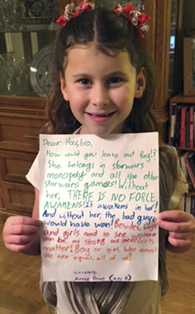 Annie Rose, 8, holds a letter she wrote to Hasbro in 2016 asking why Rey was omitted from a game based on "Star Wars: The Force Awakens."