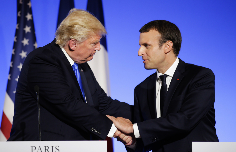 President Trump and French President Emmanuel Macron end a news conference in July in Paris.