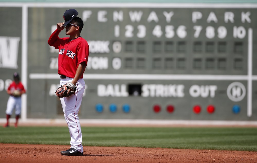 Boston's Tzu-Wei Lin waits on a batter during the second inning of the Red Sox' 3-0 loss to the New York Yankees in the first game of a doubleheader Sunday in Boston.
