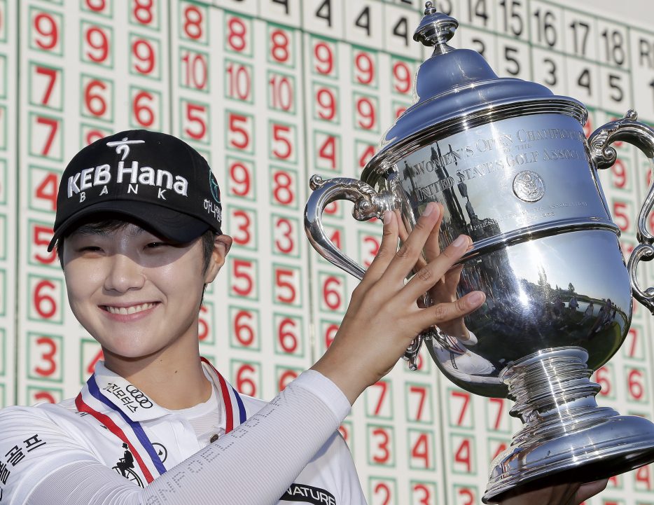 Sung Hyun Park of South Korea holds the championship trophy after winning the U.S. Women's Open on Sunday at Trump National Golf Club in Bedminster, N.J.
