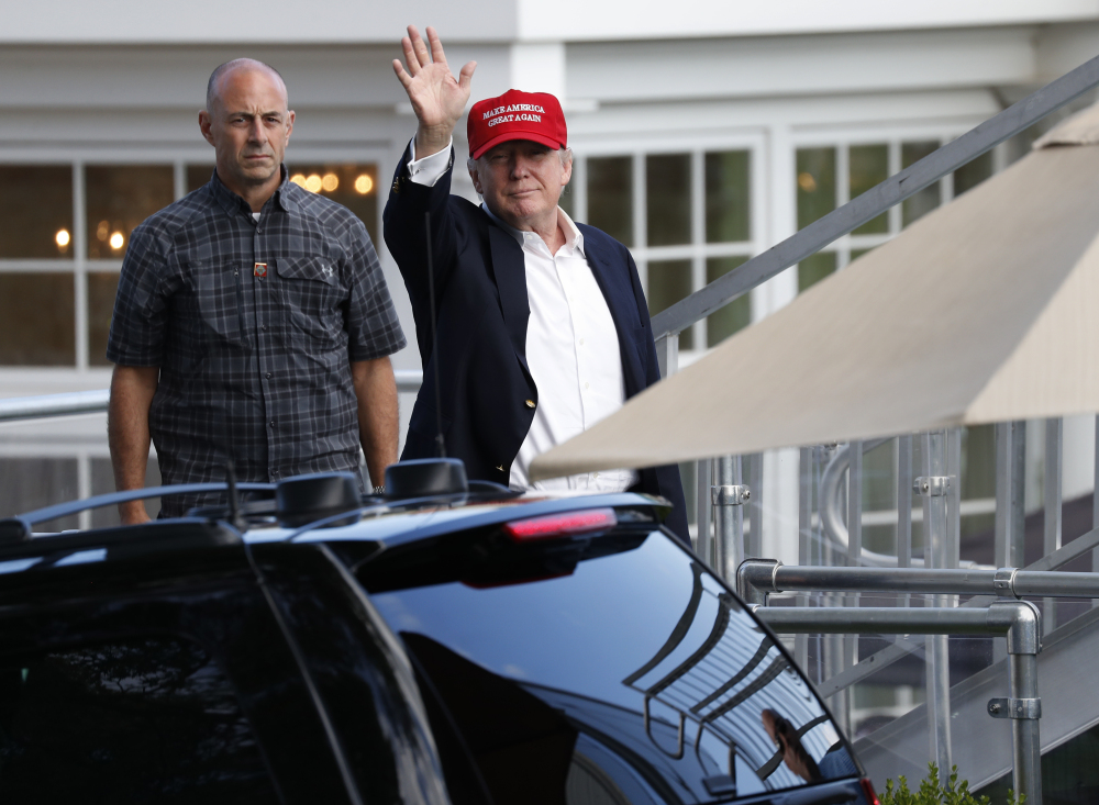 President Trump leaves his presidential viewing stand Saturday during the U.S. Women's Open Golf tournament at Trump National Golf Club in Bedminster, N.J. 