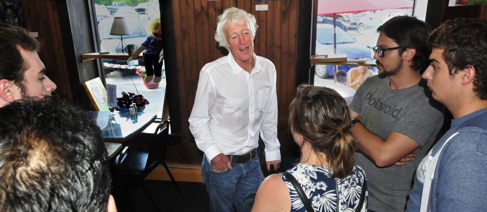 Cinematographer Roger Deakins talks with film fans at Grand Central Cafe in Waterville, after a Maine International Film Festival screening Monday. "It's just nice meeting people so enthusiastic about movies," he said.
