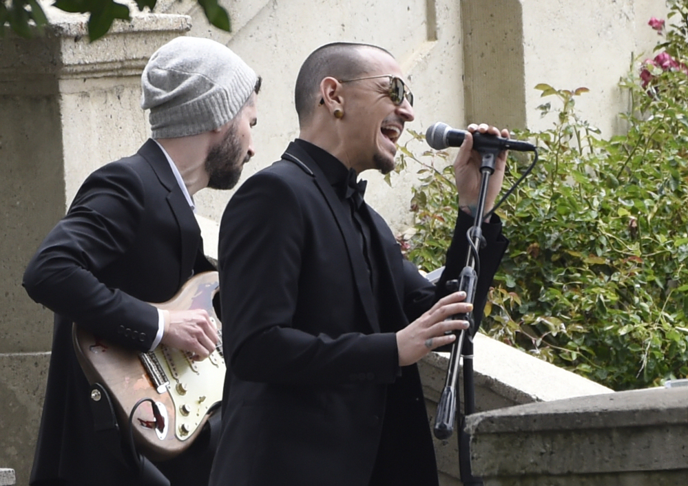 Chester Bennington, of Linkin Park, performs "Hallelujah" at a funeral for Soundgarden singer Chris Cornell at the Hollywood Forever Cemetery in Los Angeles in May. Like Cornell, Bennington died by hanging, the coroner says.