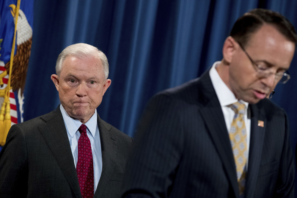 Attorney General Jeff Sessions, left, shown with Deputy Attorney General Rod Rosenstein, talked about the Trump campaign with the Russian Ambassador Sergei Sislyak, intelligence intercepts of Sislyak's communications show. The sources noted that Sislyak could have mischaracterized the interactions in his reports to his bosses.