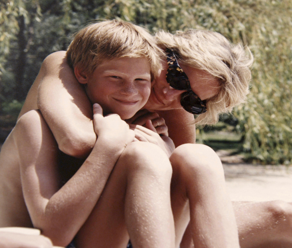 A family photo of the late Princess Diana and Prince Harry on holiday is featured in the documentary "Diana, Our Mother: Her Life and Legacy," airing Monday on HBO and on ITV in Britain.
