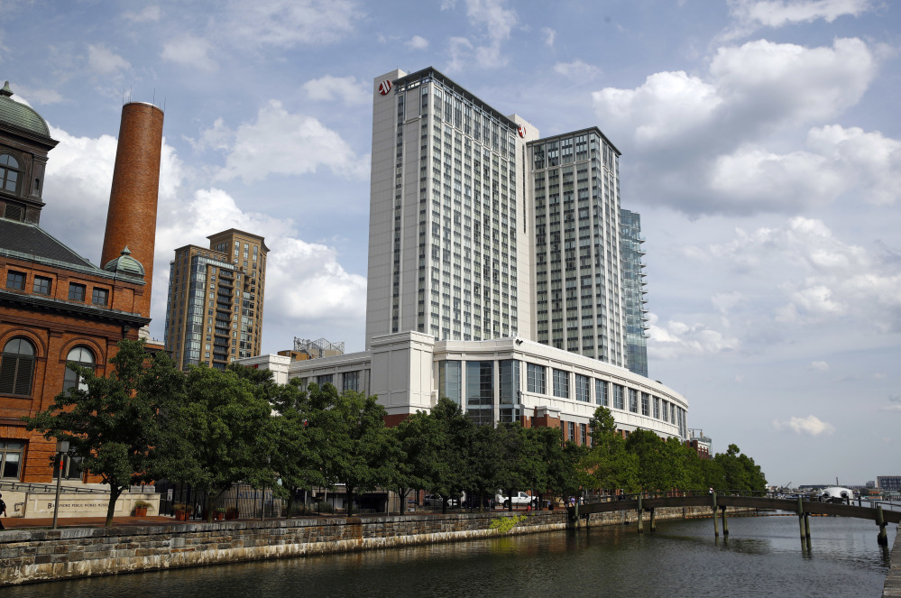 Among U.S. structures that appear to have been built with cladding made by the Arconic company include the Baltimore Marriott Waterfront hotel, above, which towers more than 30 stories over the city's harbor, the Cleveland Browns' football stadium, and a school in Alaska, according to Arconic brochures. British authorities are examining whether the panels helped spread the fire that ripped across the Grenfell Tower's outer walls June 14, killing at least 80 people.