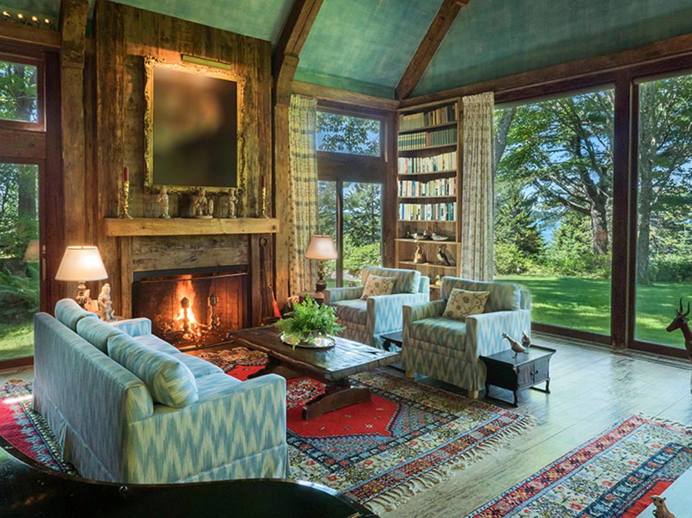 The seven-bedroom, 5,034-square-foot main house on the Rockefeller estate includes this living room. The main home and estate sit on 14.5 acres and were designed by Peggy Rockefeller in 1972.