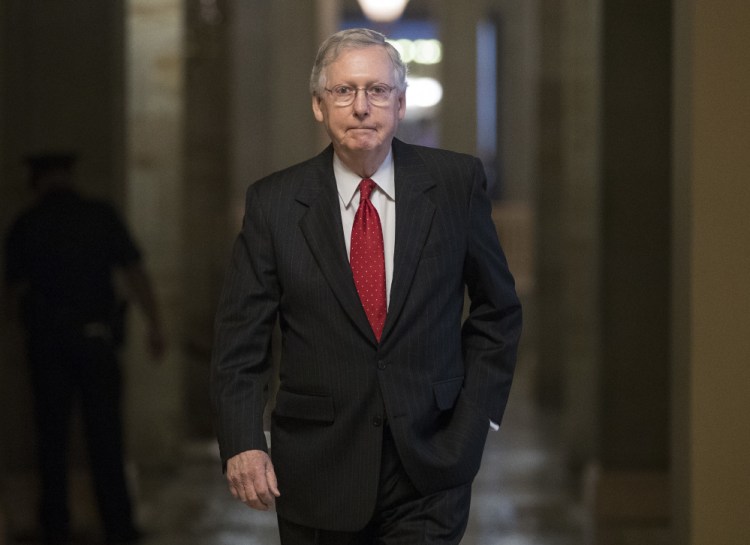 Senate Majority Leader Mitch McConnell of Kentucky heads from his office to the Senate floor on Capitol Hill in Washington on Wednesday.