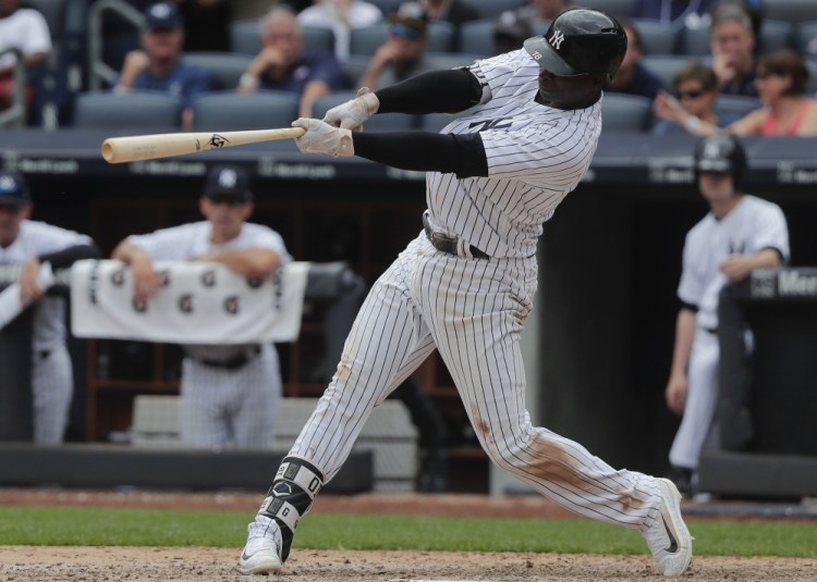 Didi Gregorius connects for a two-run homer against the Cincinnati Reds during the seventh inning of the Yankees' 9-5 victory in New York on Wednesday.