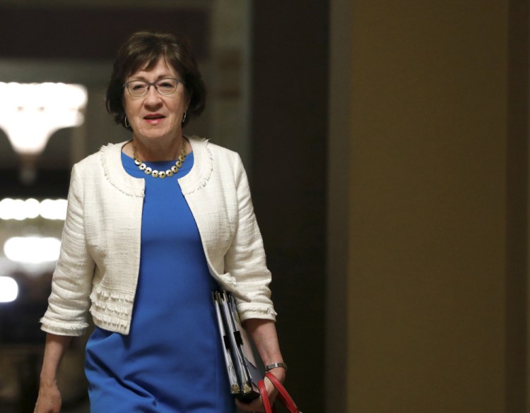 Senator Susan Collins (R-ME) walks to the Senate floor before a vote on the health care bill on Capitol Hill in Washington late Thursday night. 