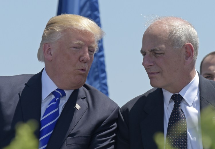 President  Trump talks with Homeland Security Secretary John Kelly in May. Trump named Kelly as his new chief of staff, ousting Reince Priebus.