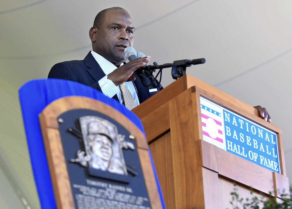 Tim Raines speaks during the National Baseball Hall of Fame induction ceremony Sunday in Cooperstown, N.Y. Raines, fifth all-time in stolen bases was elected to the Hall in his final year of eligibility.