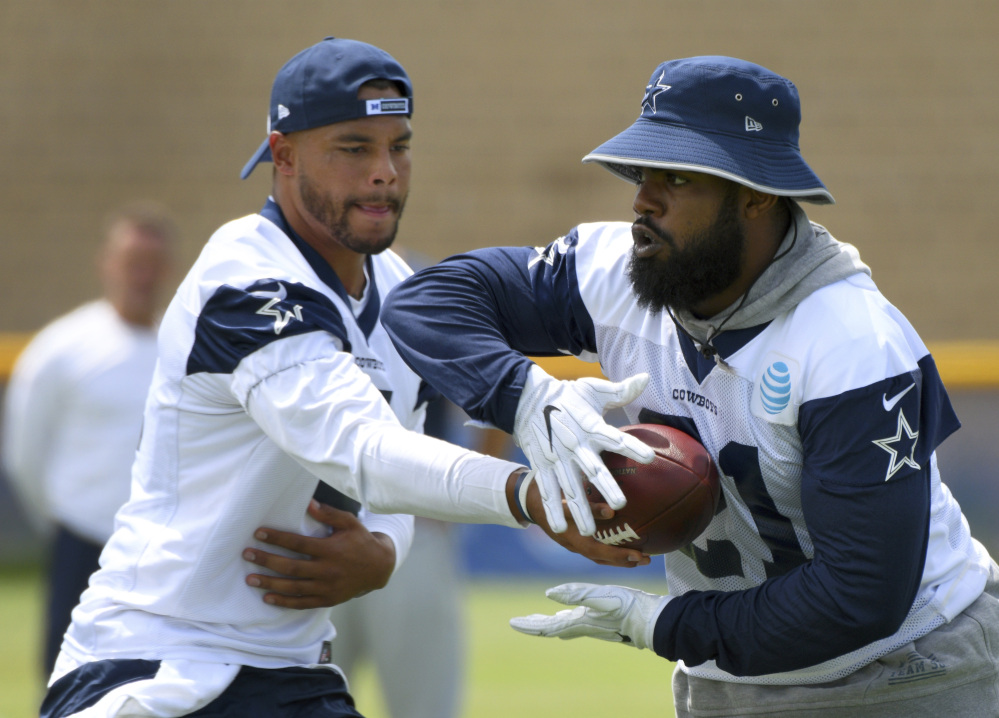 Quarterback Dak Prescott, left, and running back Ezekiel Elliott helped the Cowboys thrive during their rookie season in Dallas. The duo is seen as the key to Dallas contending for a Super Bowl, but Elliott could be suspended to start the season.