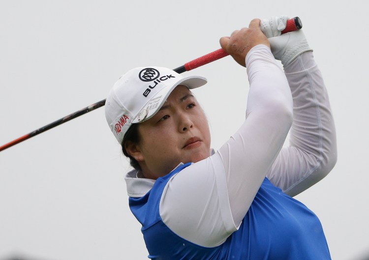 Shanshan Feng tees off on the second hole during the second round of the U.S. Women's Open Golf tournament Friday in Bedminster, N.J.