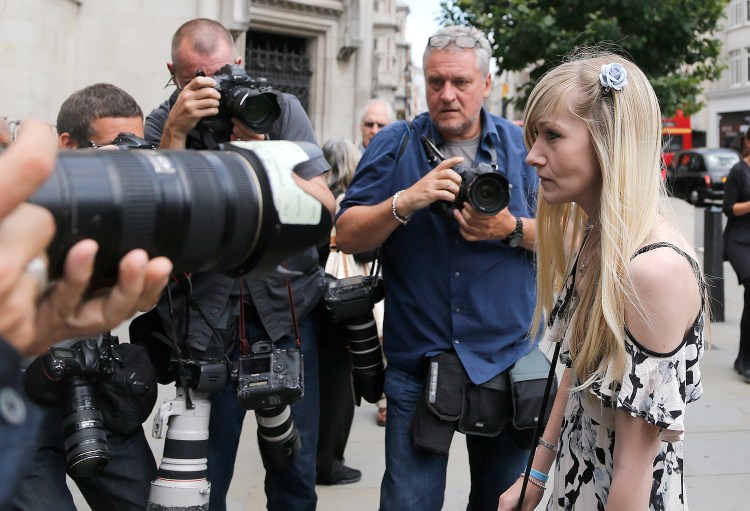 Connie Yates, mother of critically ill baby Charlie Gard arrives at the Royal Court of Justice in London Tuesday. Lawyers for the family of the critically ill infant and the hospital treating him were returning to court for a hearing a day after the baby's parents said they were dropping their long legal battle to get him experimental treatment.
