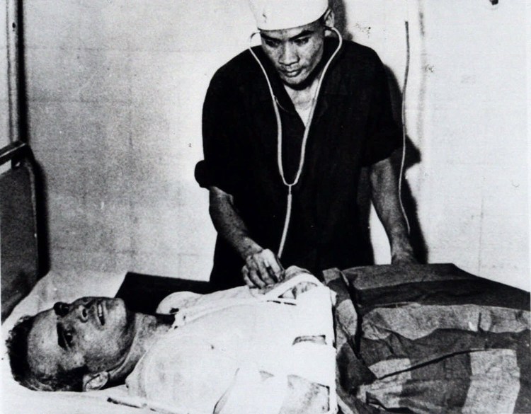 John McCain is administered to in a Hanoi, Vietnam, hospital as a prisoner of war in the fall of 1967. McCain spent 20 years in the Navy, a quarter of it in a Vietnamese prisoner of war camp after his jet was shot down over Hanoi during a bombing mission on Oct. 26, 1967. 