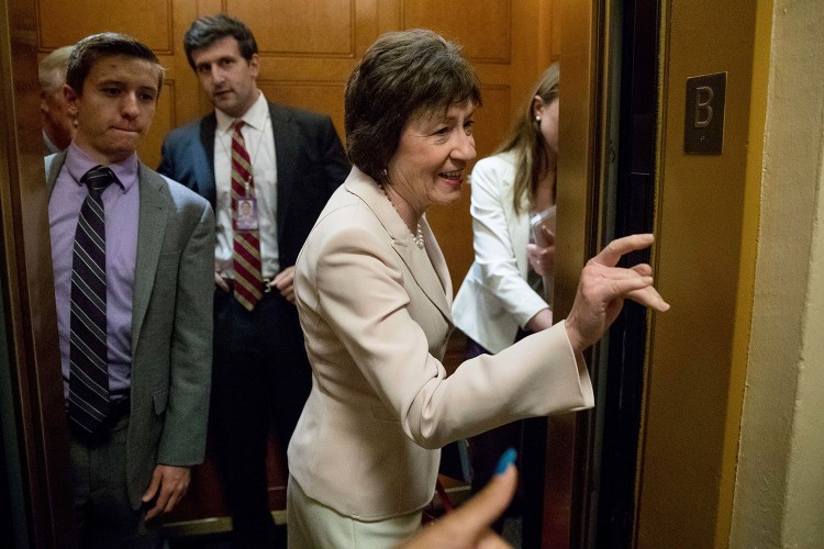 Sen. Susan Collins, R-Maine gets in an elevator as she arrives on Capitol Hill in Washington on Tuesday. Collins was among the senators who said they couldn't support a bill to repeal the Affordable Care Act without a replacement in place. 