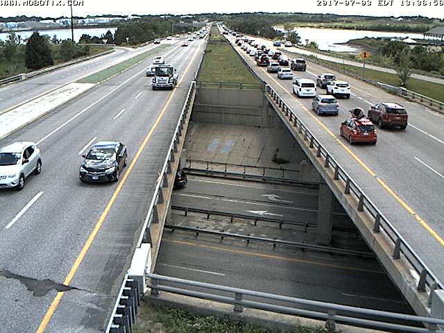 Southbound traffic on Interstate 295 is down to one lane, and cars are backed up for over a mile.  Maine Turnpike photo