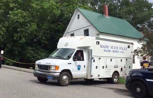 A Maine State Police crime unit vehicle on the scene of a residence in Jay where the body of Wendy Douglass, 51, was found. 