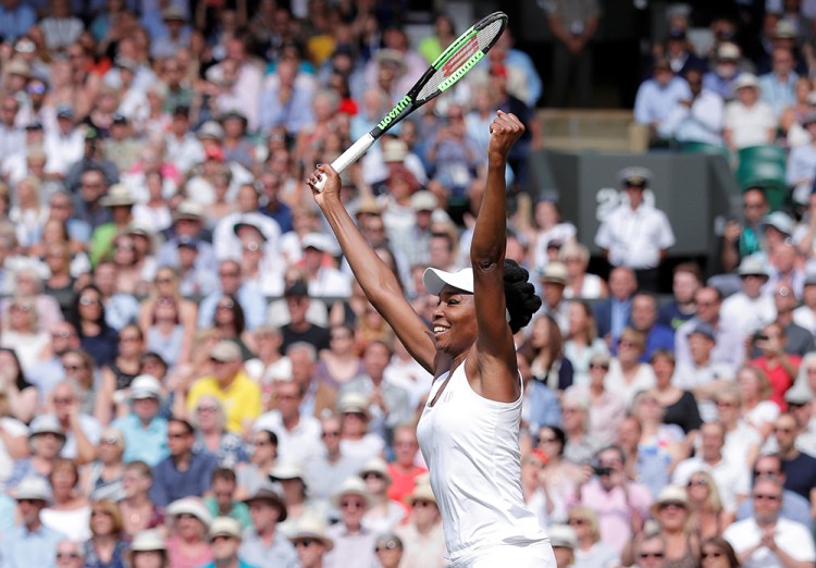 Venus Williams celebrates winning the semifinal match against Great Britain's Johanna Konta.