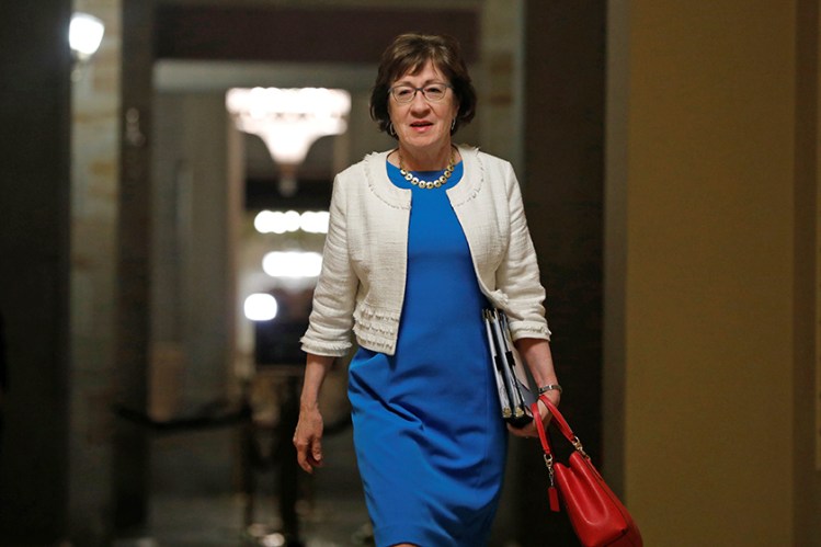 Sen. Susan Collins  walks to the Senate floor ahead of a vote on the health care bill on Capitol Hill. She cast a key vote Friday morning blocking the so-called  "skinny" repeal of the Affordable Care Act.