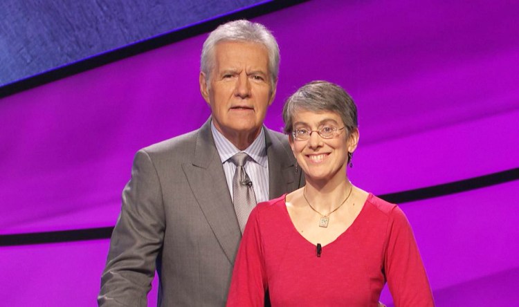 Vicky Smith of South Portland, shown here with host Alex Trebek, will compete on the TV quiz show "Jeopardy!" Friday. The show airs locally on WMTW, Channel 8.