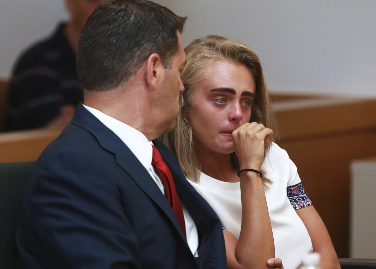 Michelle Carter awaits her sentencing in a courtroom in Taunton, Mass., on Thursday for involuntary manslaughter for encouraging Conrad Roy III to kill himself in July 2014.