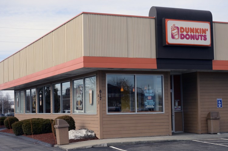 A Dunkin' Donuts is open for business on Broadway in South Portland last winter. In Pasadena, Calif., a new storefront has emerged bearing a new name and slogan: Dunkin'. Coffee and more.