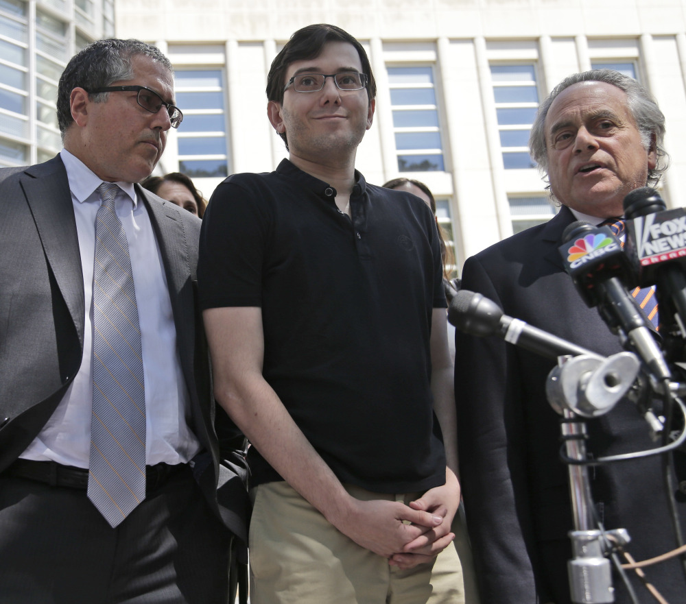 Martin Shkreli, flanked by his attorneys, talks to reporters in front of federal court in New York on Friday. "No real good can come from going on YouTube after a guilty verdict," said a former prosecutor about Shkreli's cavalier style.