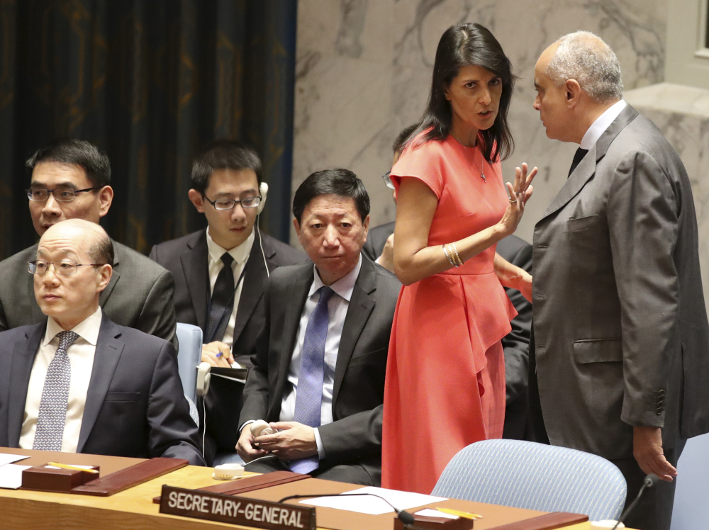 U.S. Ambassador to the United Nations Nikki Haley speaks to Egyptian Ambassador and Security Council President Amr Abdellatif Aboulatta before a vote on new sanctions to mount pressure on North Korea, pushing it to return to negotiations on its missile program.