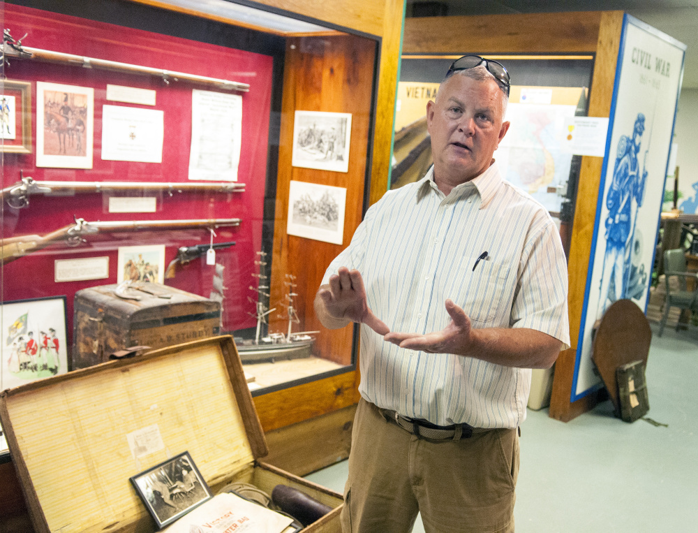 Dwaine Drummond leads a tour Thursday at the Maine Military Historical Society's museum at Camp Keyes in Augusta.
