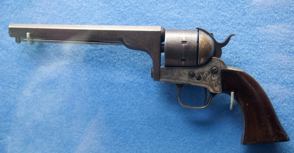 A pistol believed to have belonged to Army Maj. Gen. Joshua Chamberlain, a Civil War veteran, is part of the collection seen on a tour Thursday at the Maine Military Historical Society's museum at Camp Keyes in Augusta.
