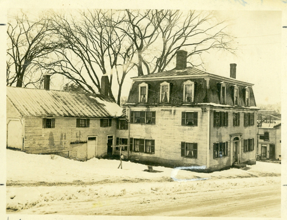 The Locke Tavern and stables, circa 1930. A February fire damaged the building, which has since been demolished.