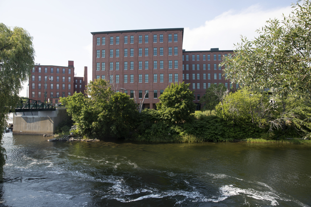 Maine Medical Center plans to move about 500 workers to the largest building in downtown Westbrook, One Riverfront Plaza, seen across the Presumpscot River. That has sparked additional small-business activity in the city.