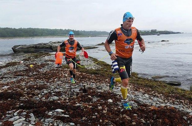Marcus Barton of Waxhaw, N.C., and Dan Kimball of Fort Mill, S.C., take part in the inaugural Casco Bay Islands SwimRun race last year. This year's event will be held Sunday morning.