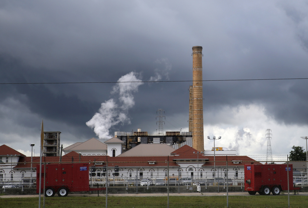 Clouds gather over the New Orleans Sewerage & Water Board facility, where turbines that power pumps have failed. Gov. John Bel Edwards declared a state of emergency Thursday in New Orleans, where some neighborhoods are at greater risk of  flooding.