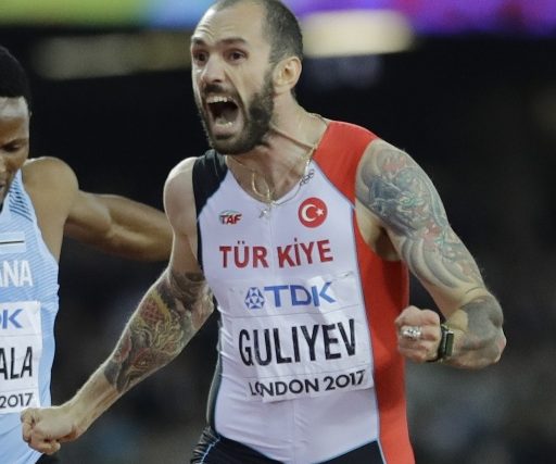 Turkey's Ramil Guliyev celebrates after his surprise victory Thursday in the men's 200-meter final at the world track and field championships in London.