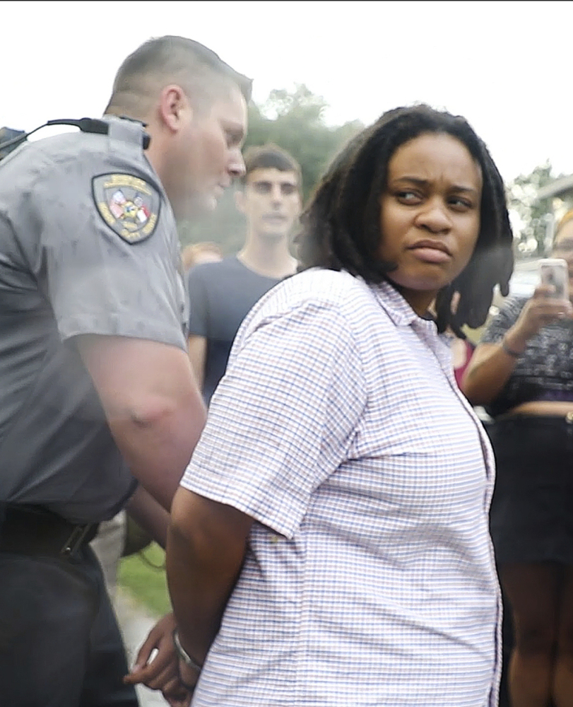 Takiyah Thompson is arrested Tuesday after admitting she helped topple a statue in Durham, N.C.