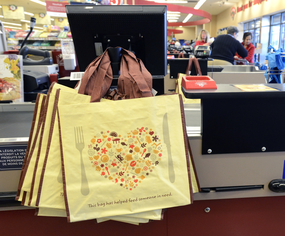 Portland's Hannaford stores began charging for plastic bags after a plastic bag ordinance went into effect in April 2015. The stores gave out these reusable bags to customers.