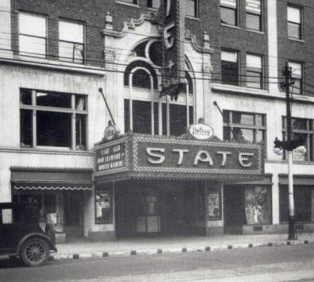 The State Theatre at Congress and High streets in Portland is shown in 1930, shortly after it opened in 1929. The light bulbs that adorned the marquee will be restored so that it again will be lit up at night.