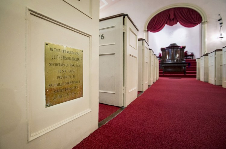 A plaque commemorating a visit to Portland by Jefferson Davis is seen Friday at the First Parish Church.