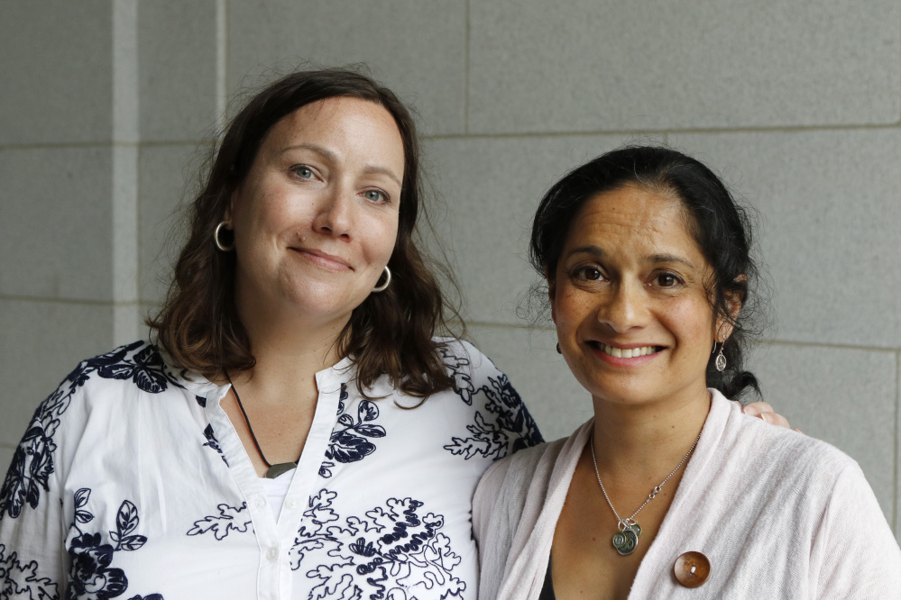 Marie Follayttar Smith, left, and Dini Merz of Mainers for Accountable Leadership. The group has drawn attention to a campaign that helps people leave white supremacy groups. Staff photo by Joel Page